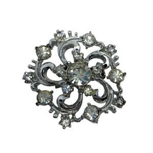 Vintage Rhinestone Swirl Brooch 1.5" Round Silvertone Setting